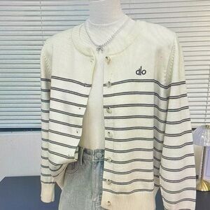 ALO Yoga Cream and Black Striped Sweater